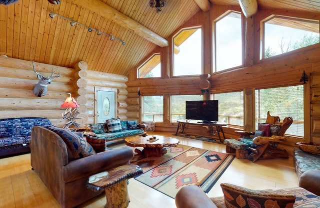 Beautiful Riverfront Log Cabin with Mountain Views, Firepit, and Gas Grill