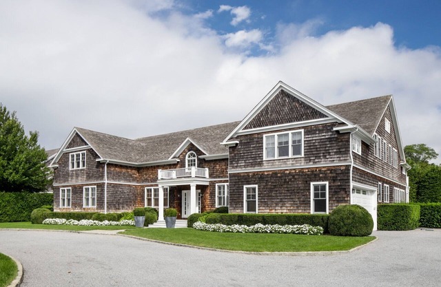 Beautiful shingle-style estate sited on one acre of land, fabulous outdoor...