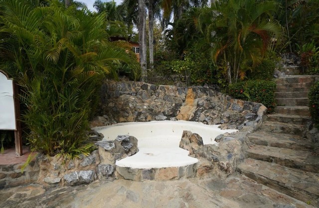Beautiful villa surrounded by tropical gardens by breathtaking Playa Bonita