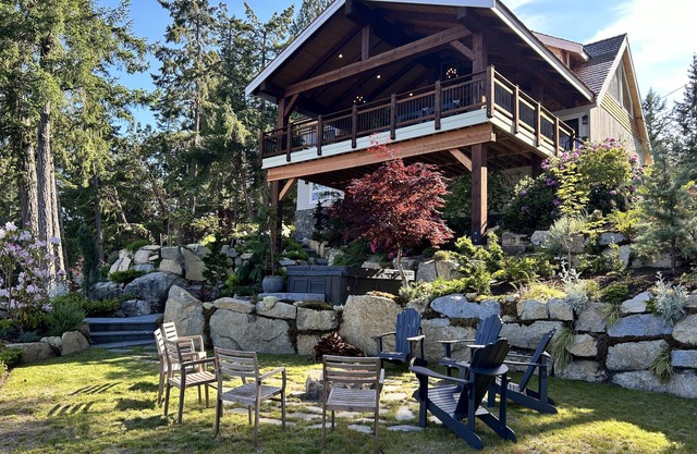Beautiful waterfront home with private dock, fire pit and hot tub