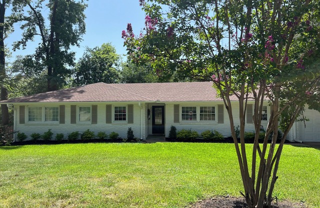 Beautifully updated 3bedroom 2 bath home with a large glassed in sunroom.
