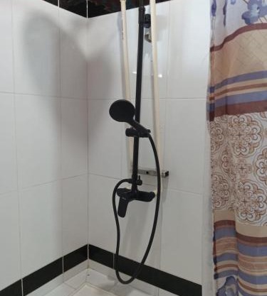 Bed and bath at Villacarolina