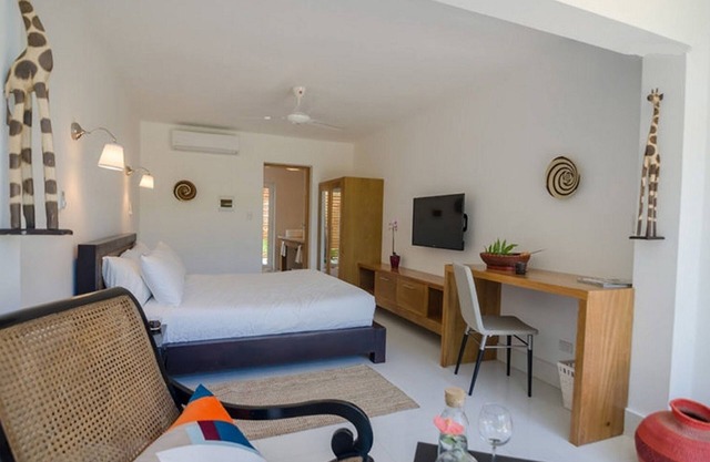 Bedroom in beachfront resort, Dominican meals available