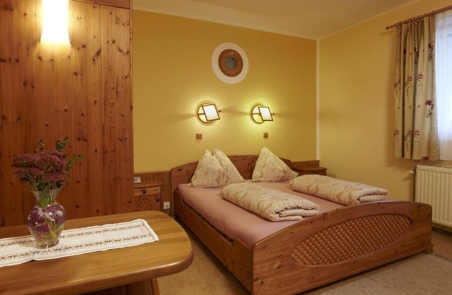 Bernstein-familien-zimmer mit Großer Sonnenterras - Biolandhaus Arche