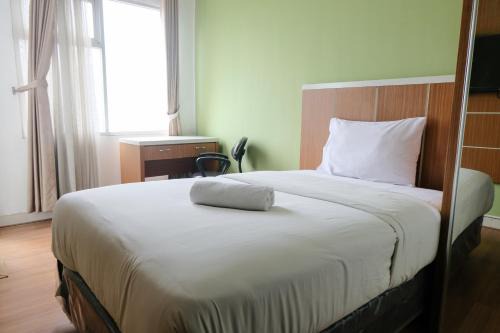 Best Deal Studio at Harvard Jatinangor Apartment By Travelio