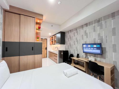 Best Deal Studio Room at Delft Ciputra Makassar Apartment By Travelio