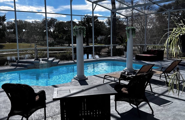 Big Beautiful Master bedroom with pool view!