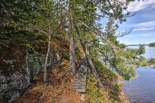 Boat Dock and Beach Charming Stop Island Cabin