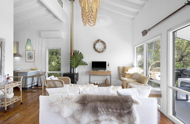 Bouddi Bungalow - This peaceful holiday retreat with luxury water views offers the best of a tree change and sea change. Soaked in natural light with a wonderful north easterly aspect, you'll enjoy sunrises over Bouddi National Park escarpment lighting...