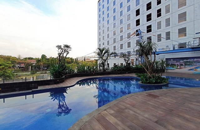 Brand New and Homey Studio at Tamansari Skylounge Makassar Apartment