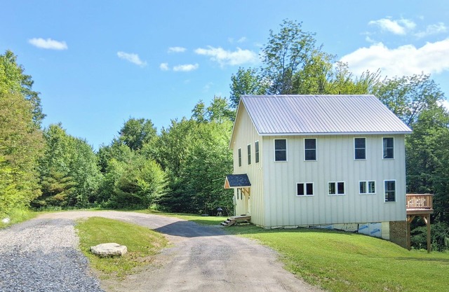 Brand new family home nestled in the woods close to Waterbury, Stowe, and Sugarbush
