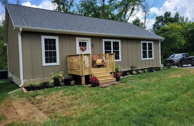 Brand new! Husky Hideaway with hot tub!