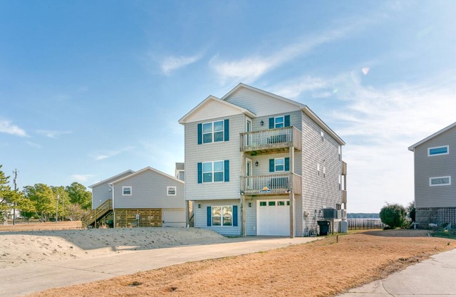 Breathtaking sound & sunset views from this waterfront home on Colington Island!