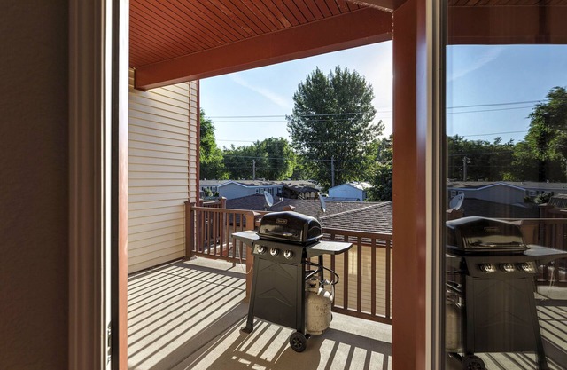 Bright, airy, contemporary row home located in Orchard Home