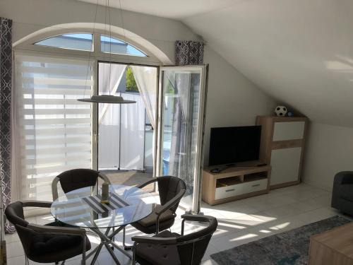 Bright attic apartment near Augsburg