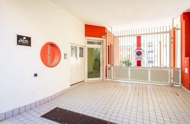Bright first floor apartment - equipped with lift and internal parking.
