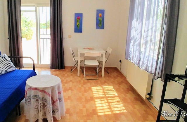 Bright studio apartment with secure parking and share of owners' pool