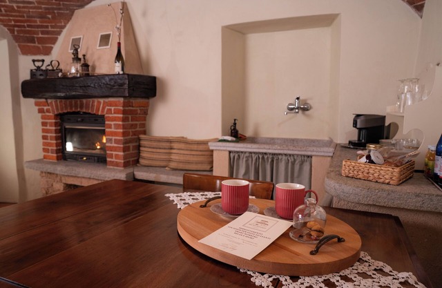 Bruno Selvago's Casba. Rustic house with exposed brick surrounded by vineyards.