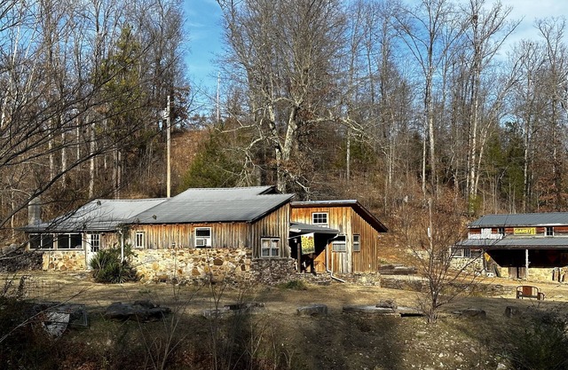 Bumpy’s Hollow~tranquil farmhouse built around a mid-1800's hand hewn log cabin
