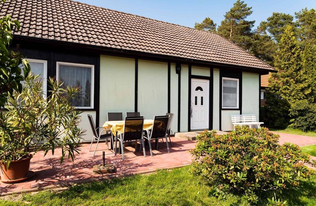 Casa vacacional con terraza y jardín