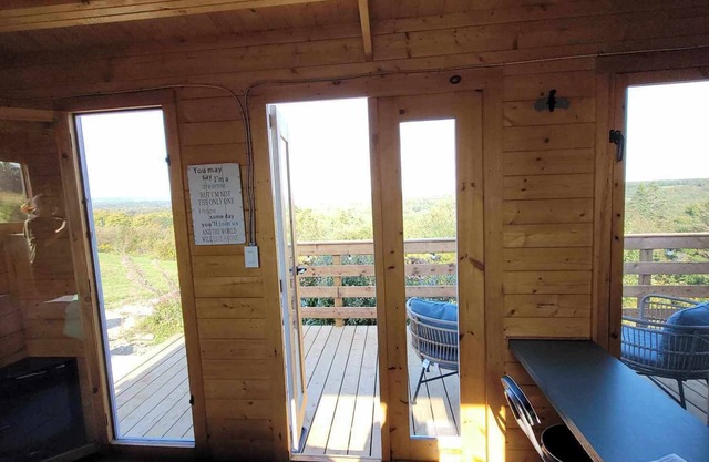 Bunkie with spectacular view, peaceful setting, and close to amenities.
