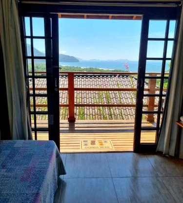 Burung Flats Itamambuca - Hospedagem com vista para o mar