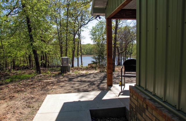 Cabin Bunkhouse with Hot tub Private Lake view in Vian, OK!