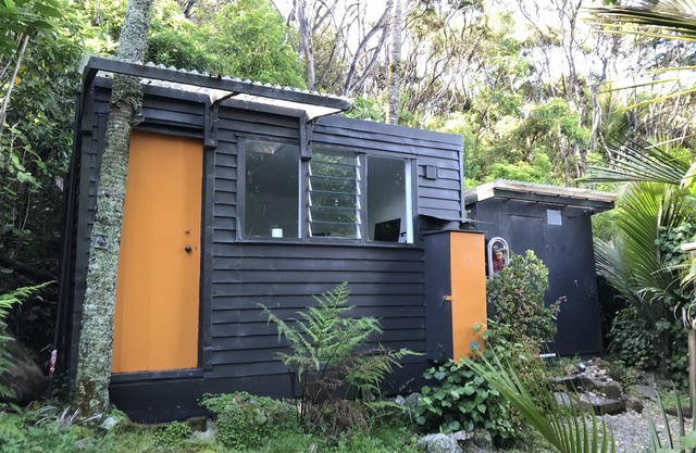 Cabins in the bush. Sea views and abundant native bird life.