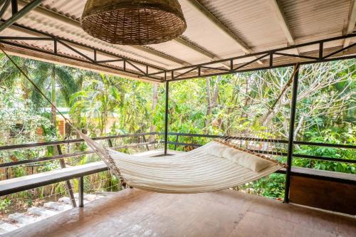 CAHAYA Nest Self-Service Home in Rainforest with Kitchen - AC, Monkeys, Bats!