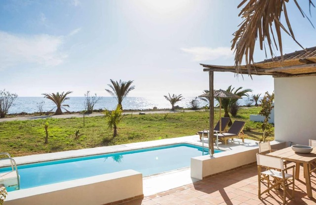 Calming, neutral villa, private and communal pool