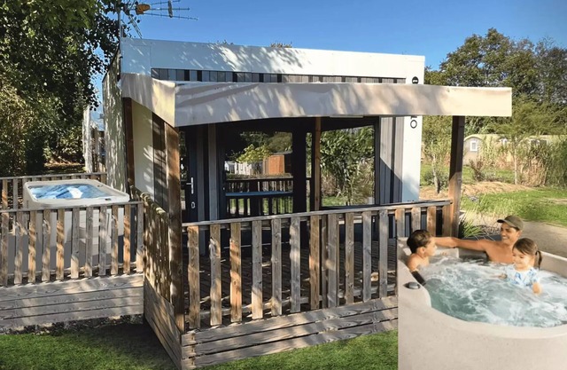 Camping Au Pré de l'Etang *** - Mobile Home Otello Solo Premium 2 rooms 2 people with SPA
