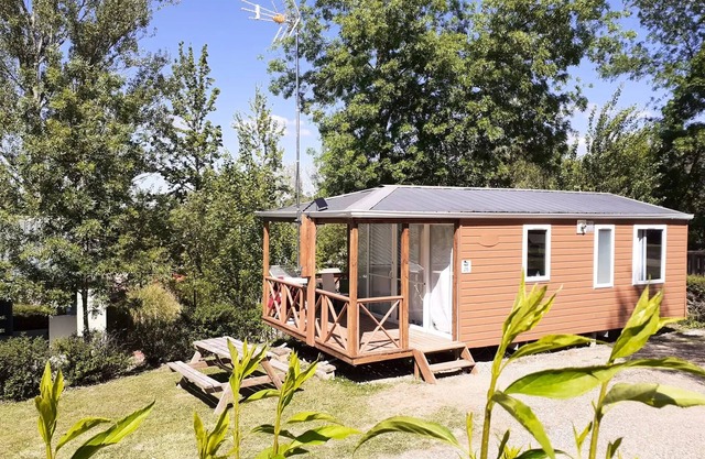Camping Flower du Lac de Thésauque *** - Standard mobile home 28m² 2 bedrooms - air conditioning + TV + terrace 4 people