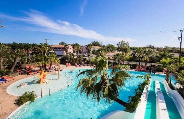 Camping l'Etoile de Mer **** - Casa móvil Grand Comfort climatizada de 4 habitaciones para 6/8 personas