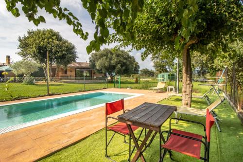 Can Noguer Casa con piscina y jardín
