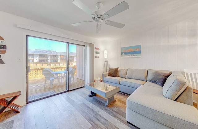 Canal-front condo with deck, balcony, grill, pool, dock, & tennis - near beach