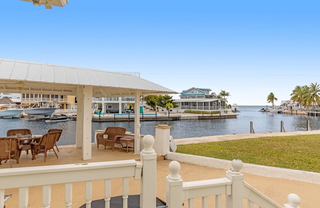 Canal Front Gem W/ Private Dock, PS4, Free WiFi, & Expansive Balcony W/ Views