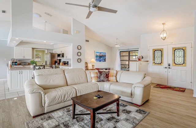 Canal-front home with sandy beaches, golf courses, dock, & refreshing pool