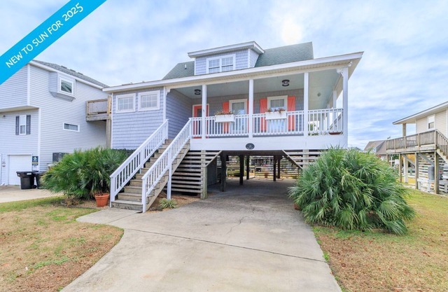 Canalfront home w/ wraparound decks and community amenities!
