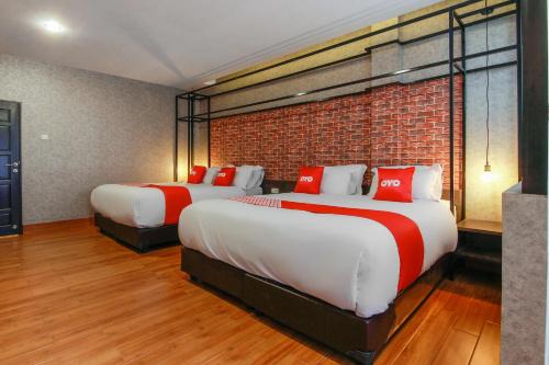 Capital O 3476 Millenium Inn