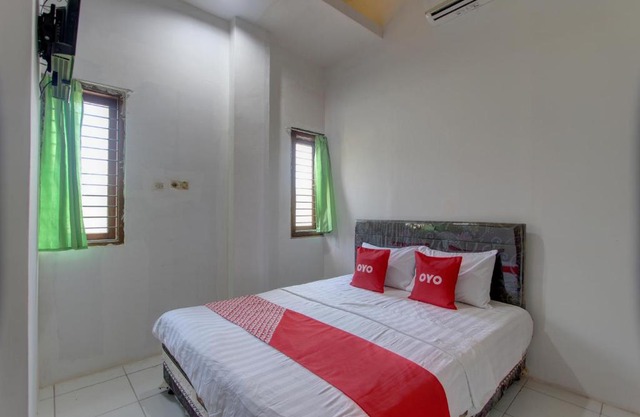 Capital O 91690 Moza Guest House