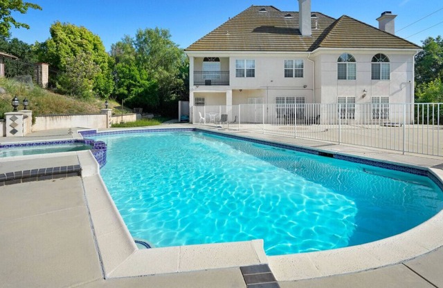 Captivating Chateau Getaway in Covina: 5BR Oasis with Pool, Fitness Studio, X-box Gaming, Chess, and Enchanting Gardens