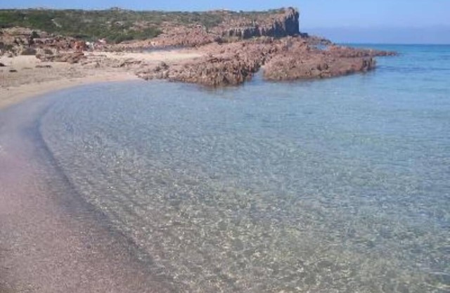 Encantadora villa "carlofortina2con jardín privado a 2 pasos del mar