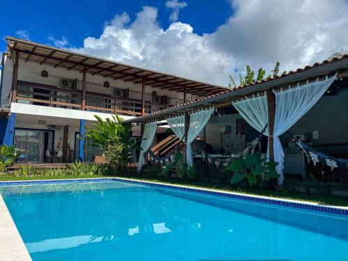 Casa Brisa - WIFI; PISCINA e Café da Manhã a 520m do Centro de Arraial