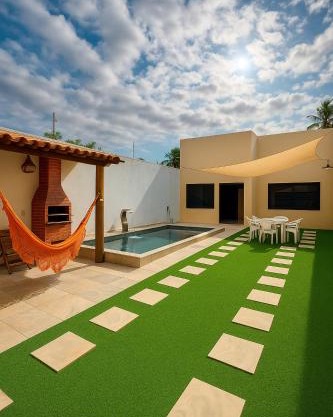 Casa Climatizada com Piscina e Área de Churrasco 400B