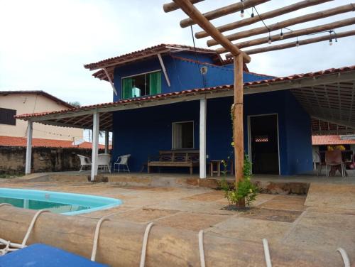 Casa com 4 quartos e piscina no Coqueiro