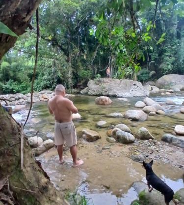 Casa com cachoeira no quintal