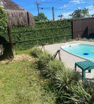 Casa com piscina a 500 metros da praia