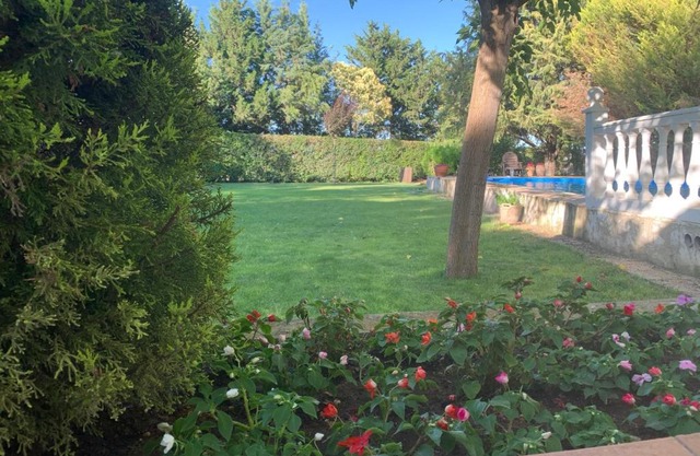 Casa con jardin