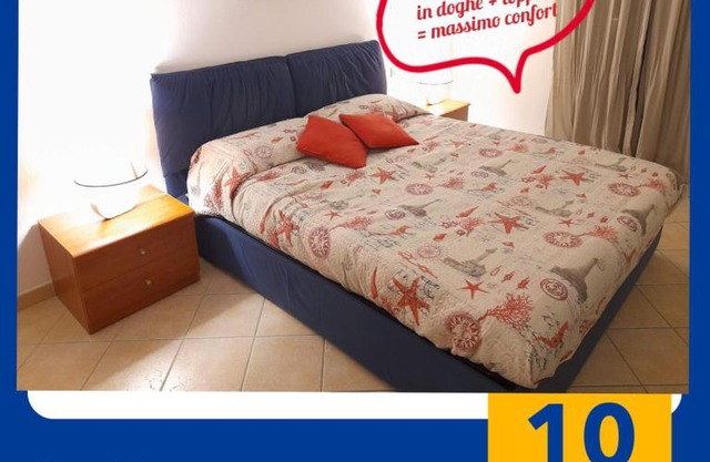 Casa Corallo Muravera Appartamento Centralissimo due camere letto cucina e soggiorno nuovo letto matrimoniale e singoli Aria condizionata Parcheggio interno Coperto ideale x 2 o 3 moto