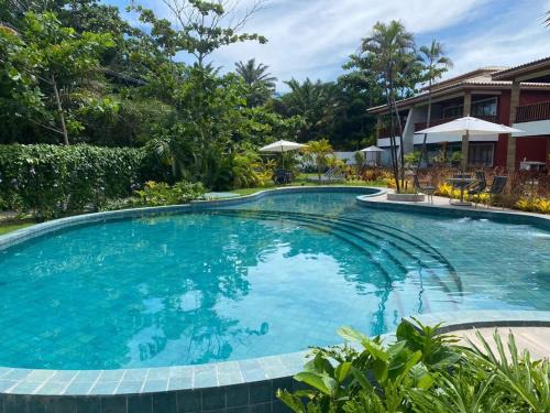 Casa de Praia em Imbassaí com Varanda, Conforto e Natureza